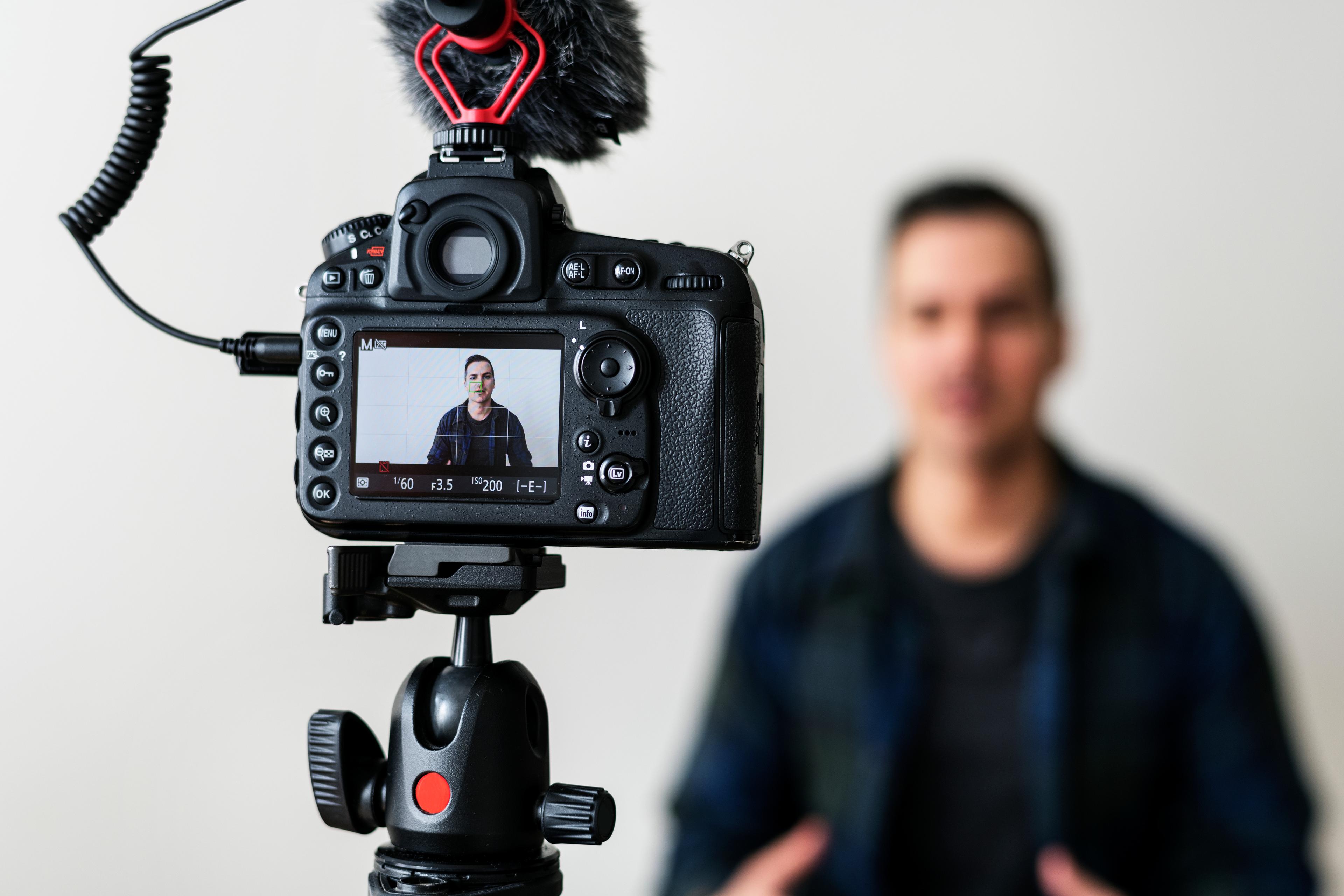 Man being filmed for a testimonial video